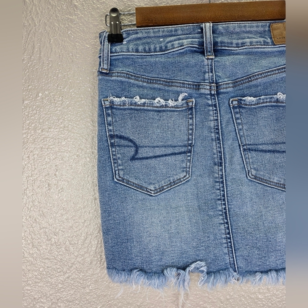 American Eagle Super Stretch  High-Waist Distress Denim Mini Skirt Raw Hem Sz 2 - Picture 8 of 13